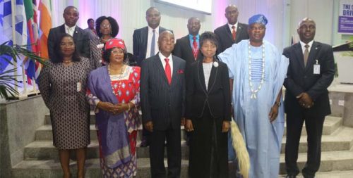 L-R: Frontrow Conference Chairperson, Ms. Cecilia Akintomide; former President of Malawi, Mrs. Joyce Banda; Dr. David Oyedepo; his wife, Pastor Faith; the Olota of Otta, Oba (Prof.) Abdulkabir Obalanlege; VC, Covenant, Professor Aderemi Atayero. Rearrow: DVC, Covenant, Professor Akan Williams; Chair, Conference Organising Committee, Professor Aize Obayan; Master of Event, Professor Sheriff Folarin; Ag Registrar, Covenant, Dr. Lanre Amodu and Chaplain, Covenant, Pastor Kayode Martins in a group photo at the C-ICADI 2018