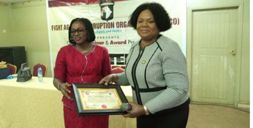 Presentation of Award of Excellence to Mrs Onadipe (L) BY Mrs. Abolarin (R)